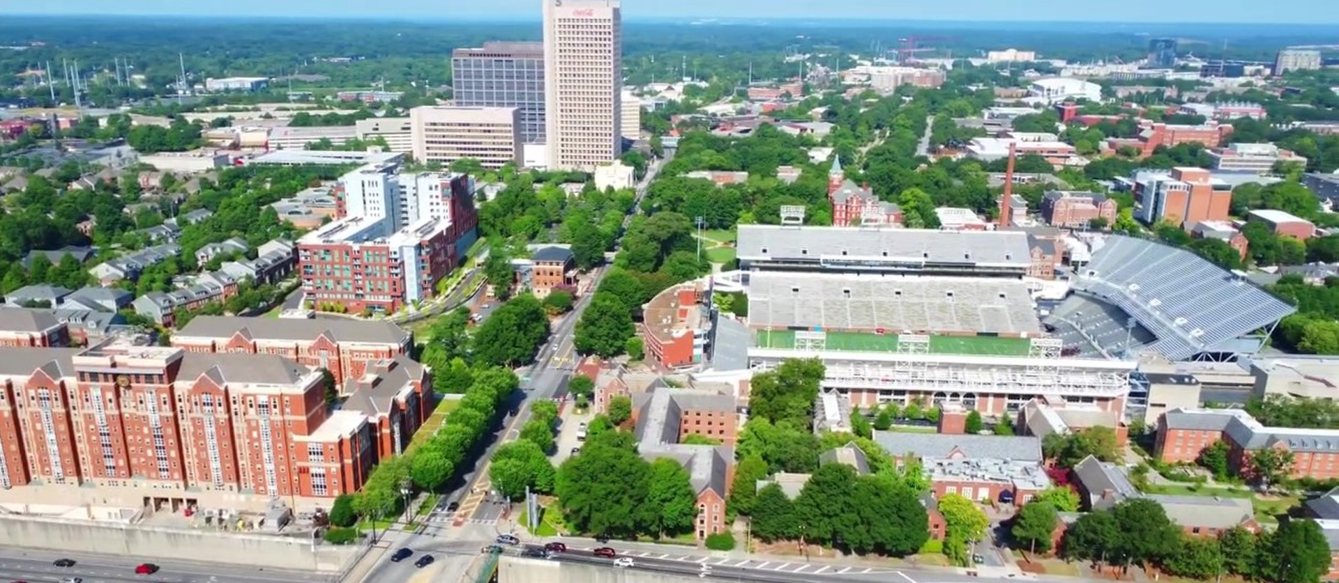 Atlanta aerial &mdash; campus, stadium, and downtown skyline behind